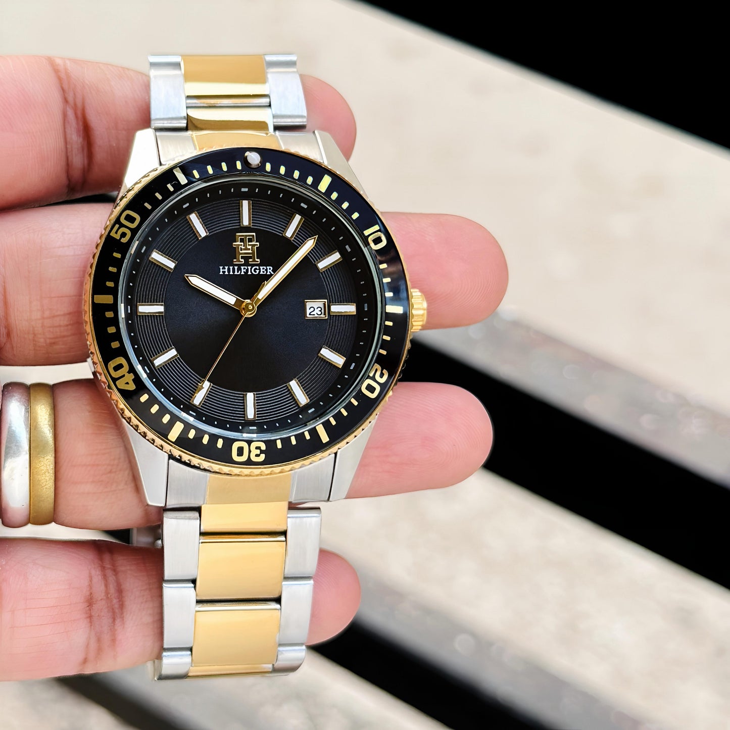 TOMMY HILFIGER MEN’S TWO-TONE STAINLESS STEEL DIVER WATCH (BLACK DIAL)