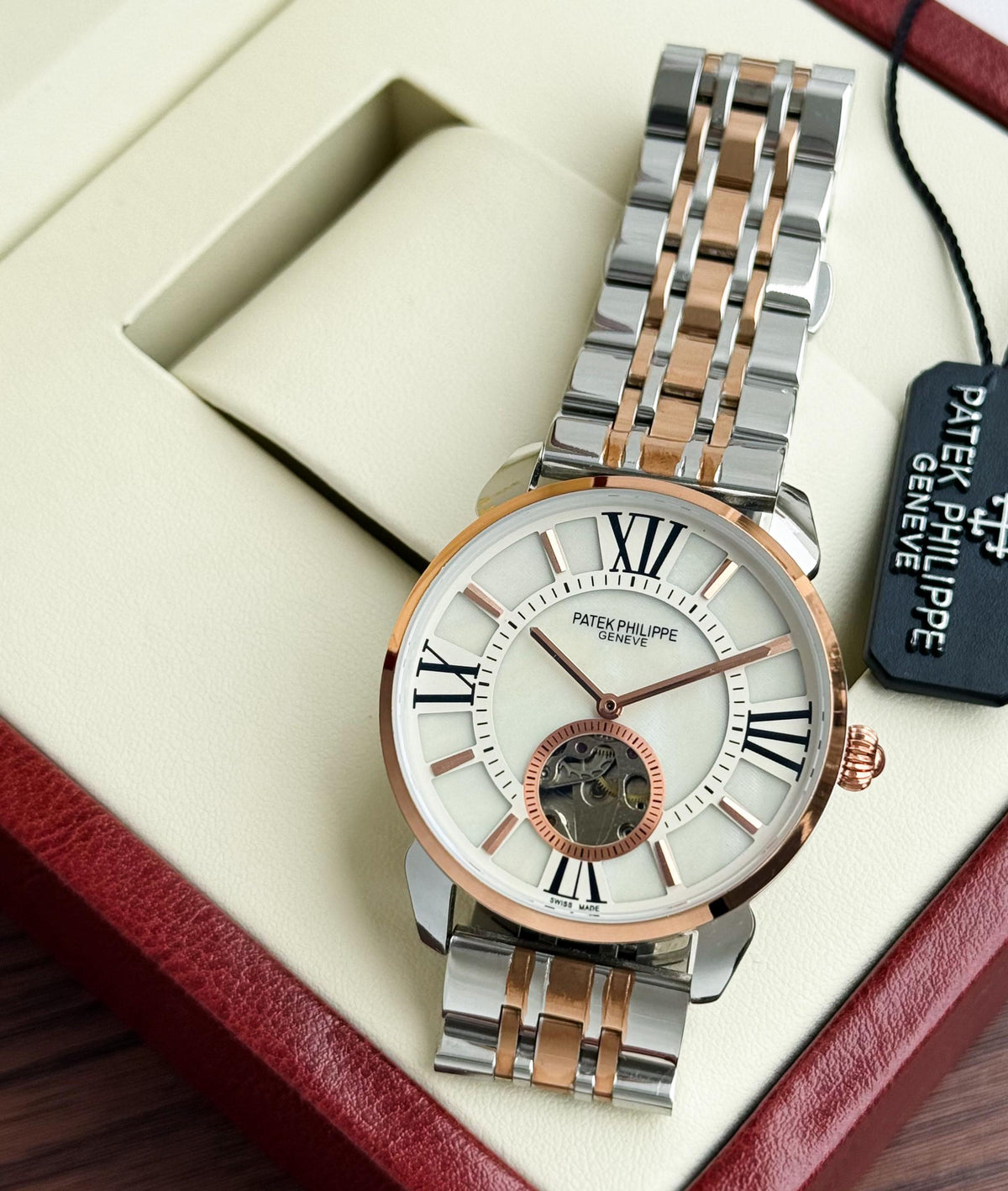 PATEK PHILIPPE MEN'S AUTOMATIC OPEN HEART WATCH – TWO TONE BRACELET WITH ROMAN DIAL