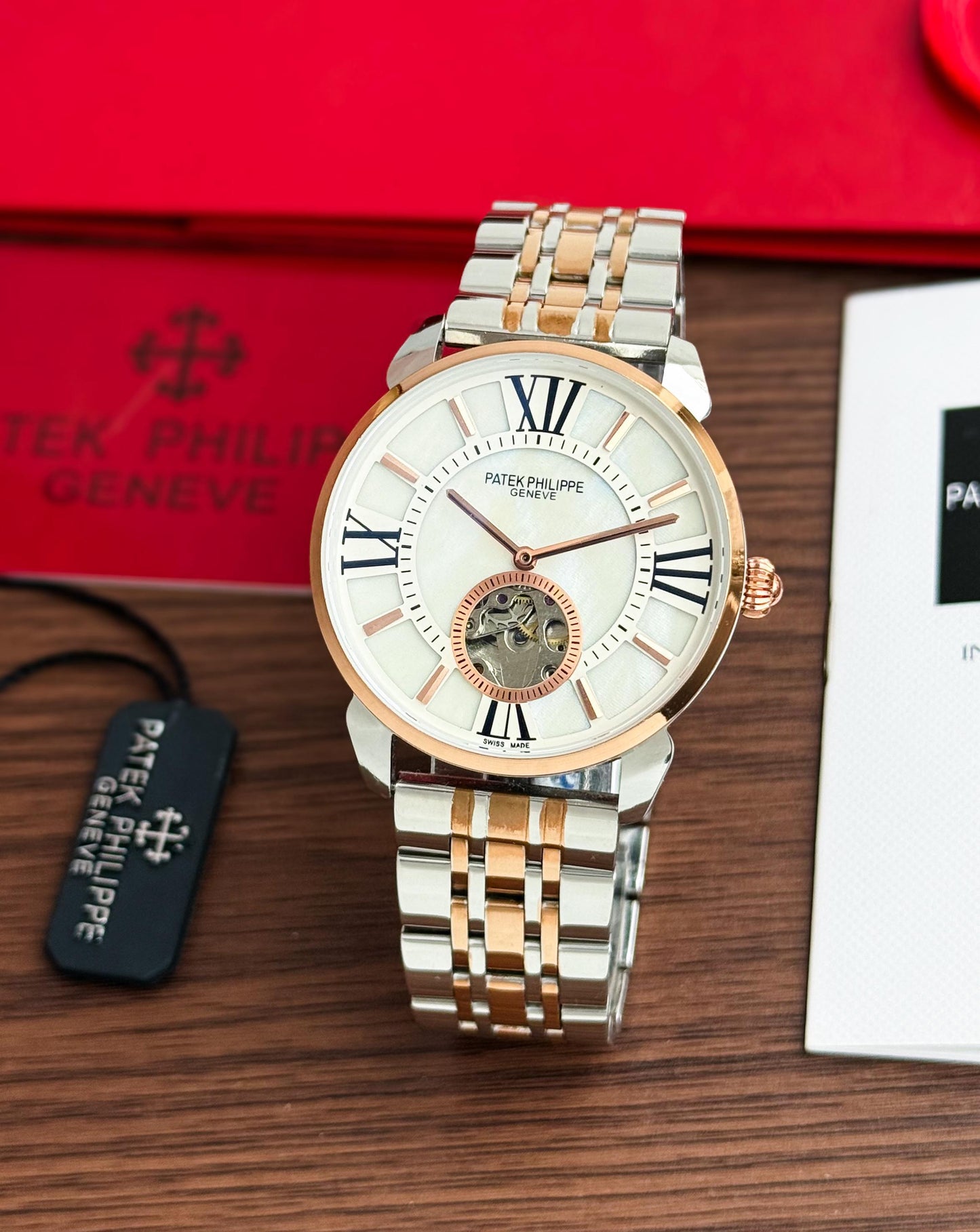 PATEK PHILIPPE MEN'S AUTOMATIC OPEN HEART WATCH – TWO TONE BRACELET WITH ROMAN DIAL