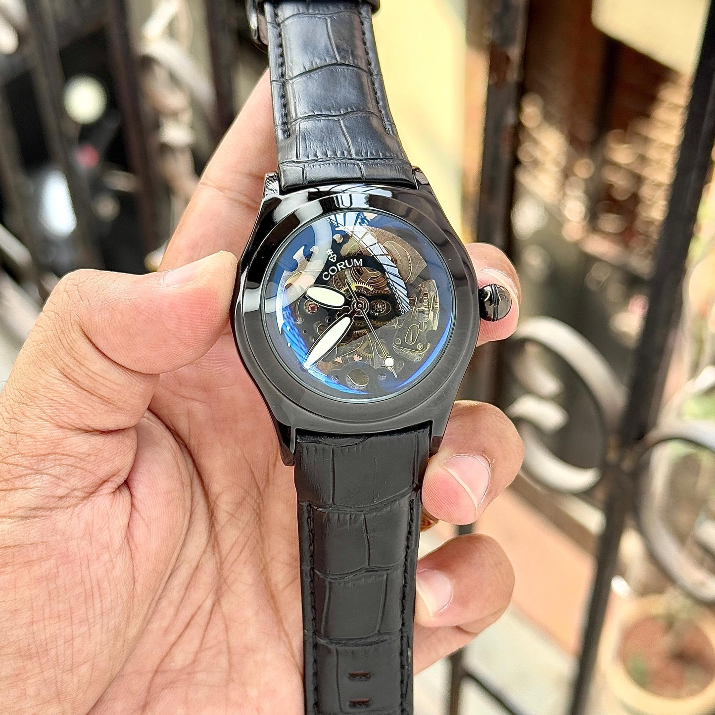 CORUM MEN'S AUTOMATIC TOURBILLON STYLE WATCH – SKELETON DIAL WITH BLACK LEATHER STRAP