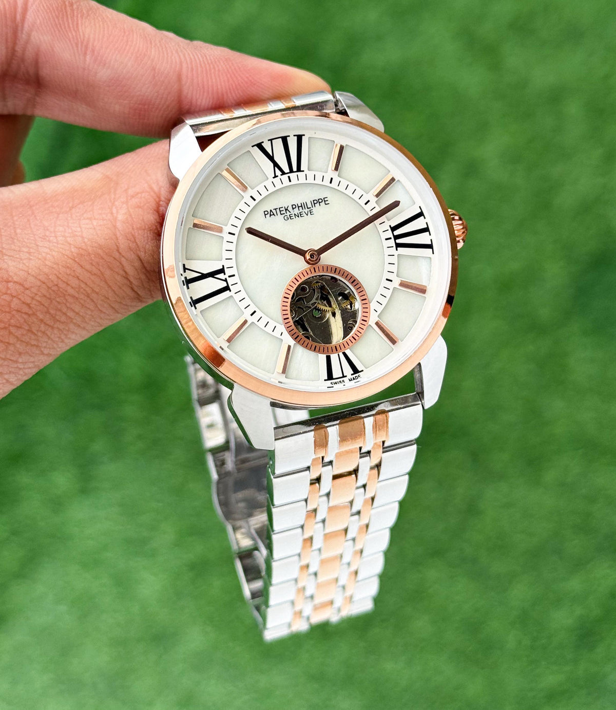 PATEK PHILIPPE MEN'S AUTOMATIC OPEN HEART WATCH – TWO TONE BRACELET WITH ROMAN DIAL